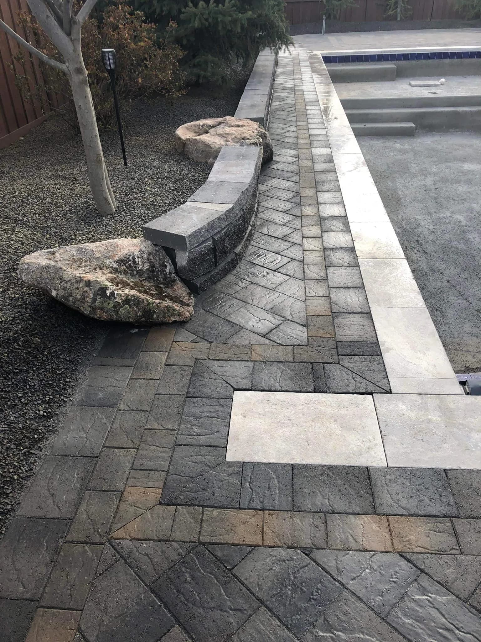 eagle idaho custom pool landscaping with stone edging and retaining wall pool photo 4