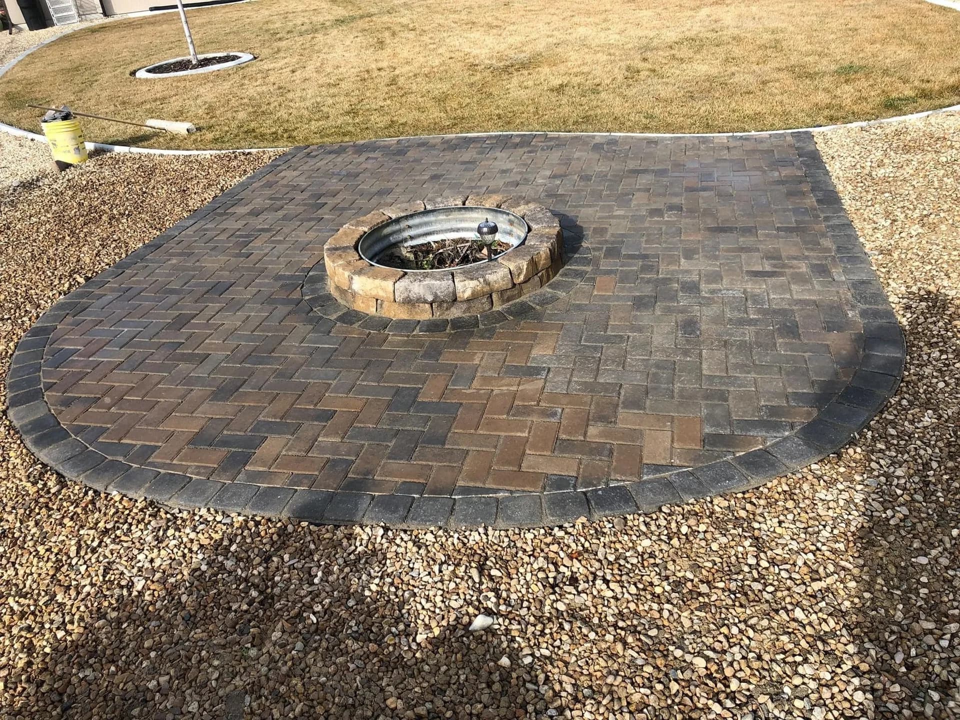 nampa idaho paver patio with custom stone fire pit photo 1