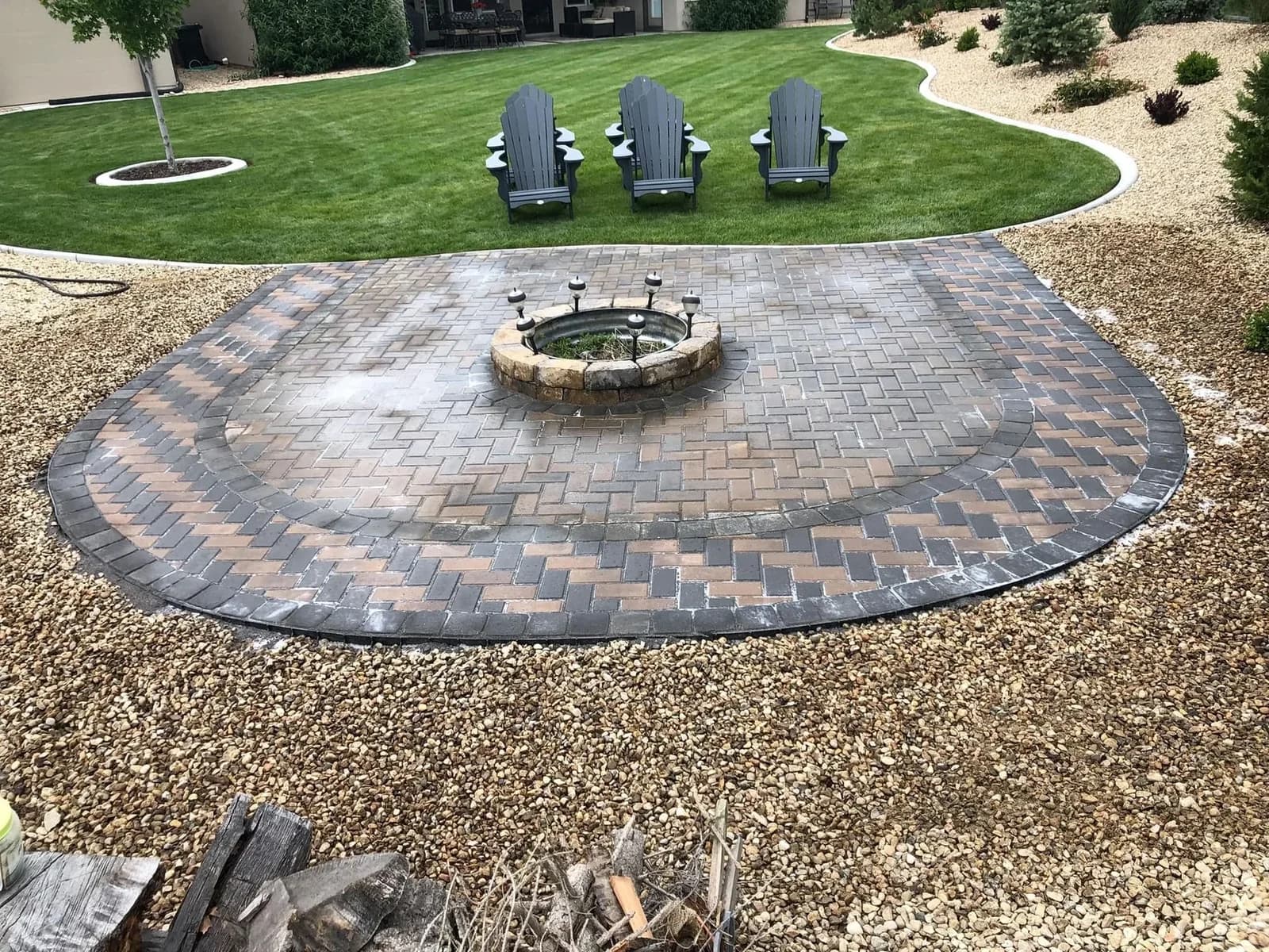 south meridian idaho custom paver patio with fire pit and lighting photo 1